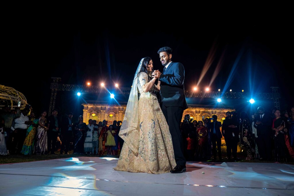 Bride and groom sharing a romantic dance on the wedding stage